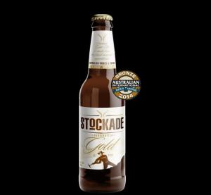 Jam&Co was asked to design the branding and the packaging of Macarthur Grange brewery&rsquo;s first beer, Stockade Gold.